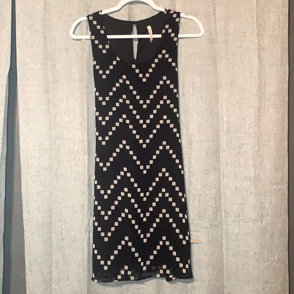 Black with white design business dress. Size medium and Millibon brand.